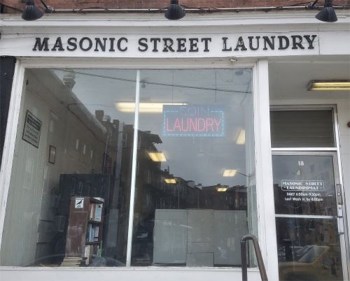 Storefront of Masonic Street Laundromat