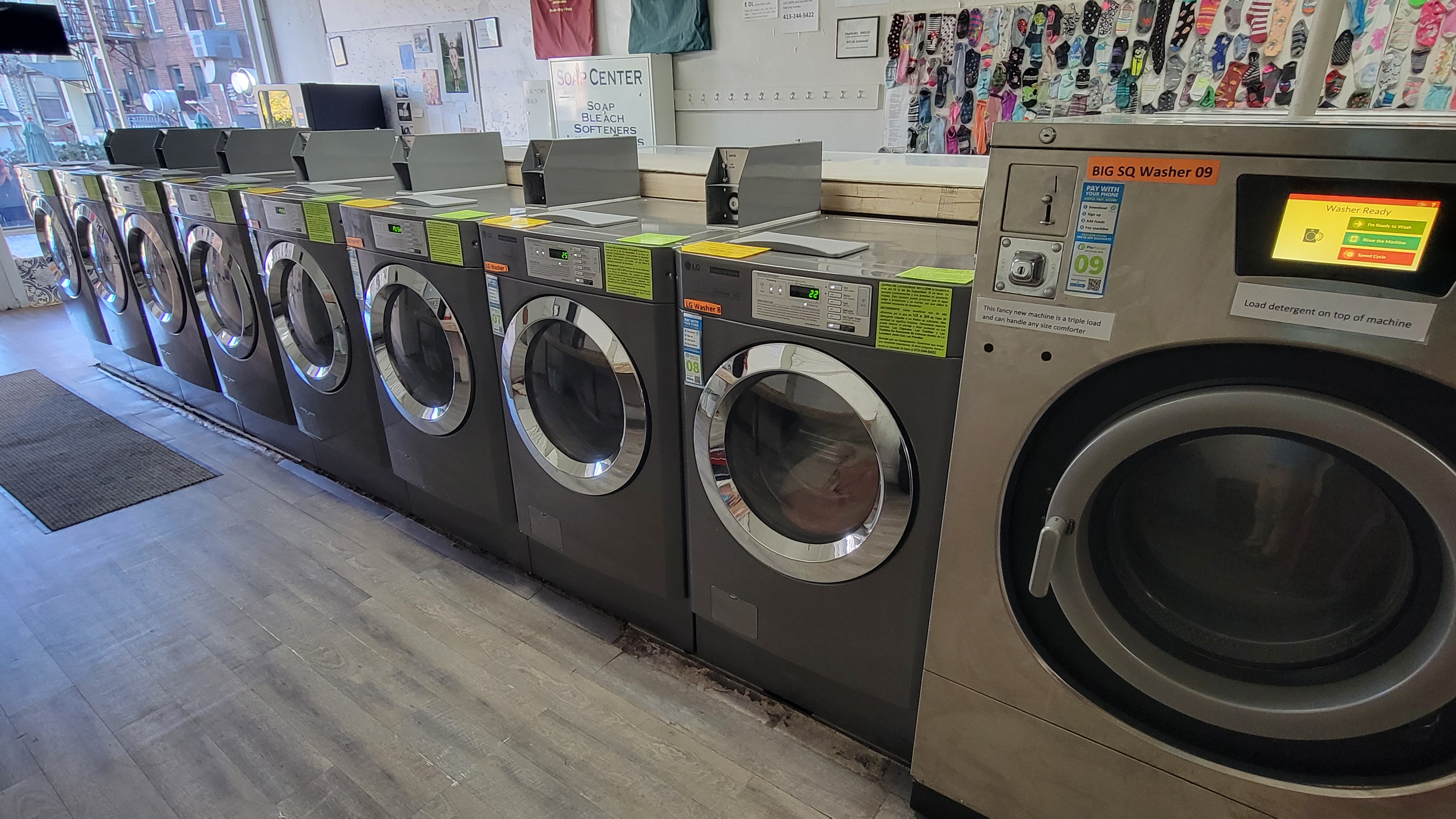 Row of Speed Queen and LG washing machines